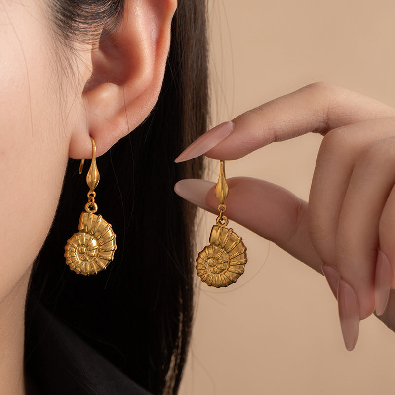 Spiral Sea Shell Dangle Earrings Enchanted Bounding™